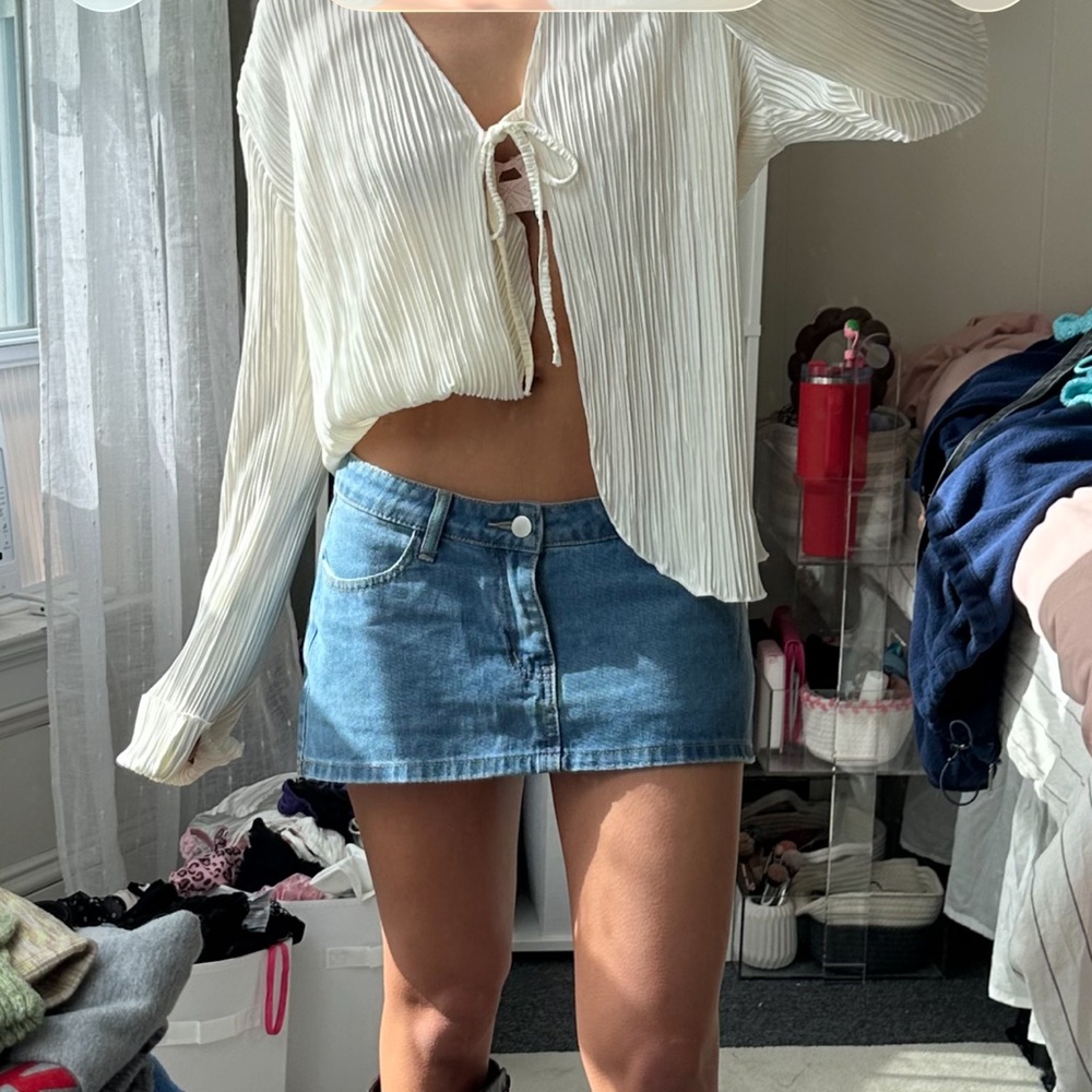 White pleated blouse with tie front